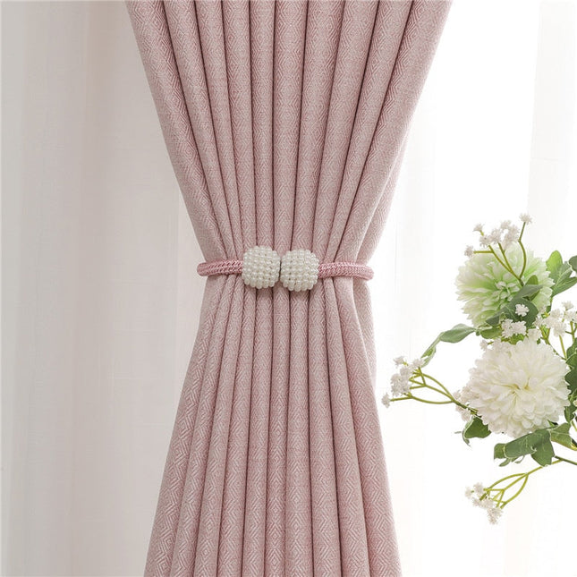 Růžový dekorační závěs s texturou