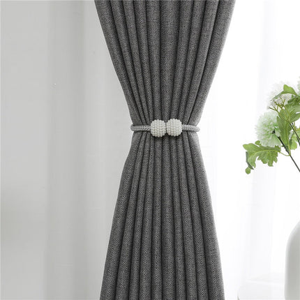 Šedý zatemňovací závěs s texturou