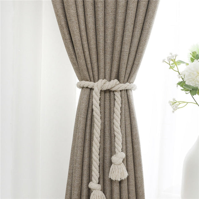 Tmavě béžový elegantní závěs do obýváku