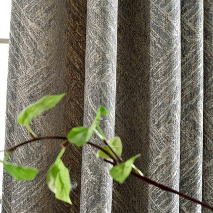 Moderní texturovaný zatemňovací závěs do ložnice