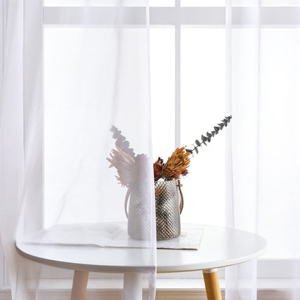 Polopropustný závěs s kovovými kroužky