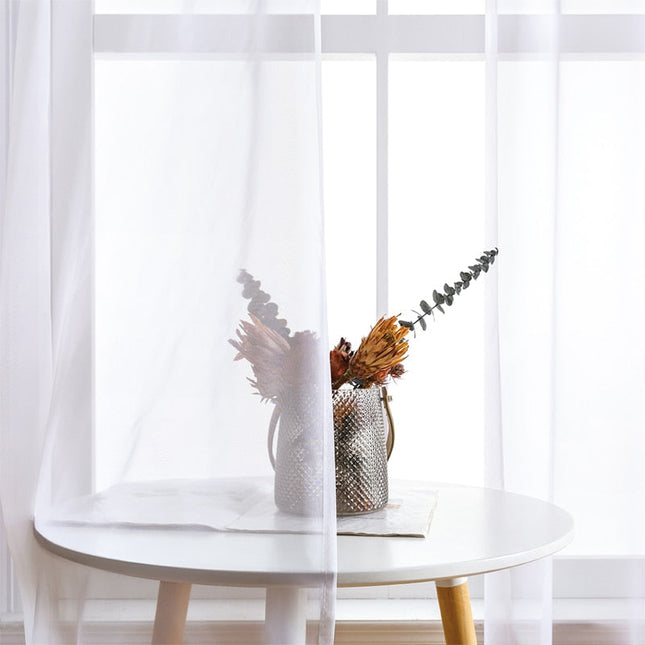 Polopropustný závěs s kovovými kroužky