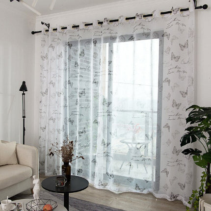 Průsvitná záclona se vzorem motýlů