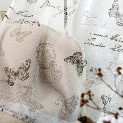 Průsvitná záclona se vzorem motýlů