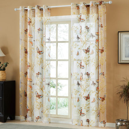 Záclona s vyšívanými barevnými motýly