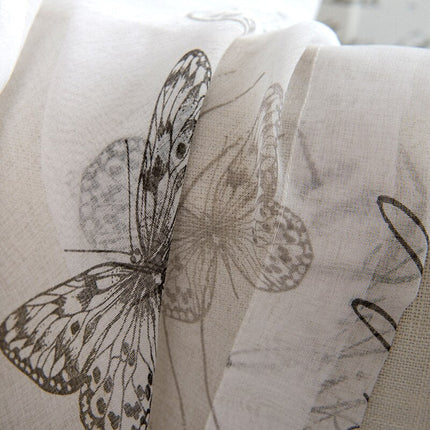 Průsvitná záclona se vzorem motýlů