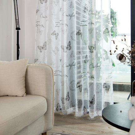 Průsvitná záclona se vzorem motýlů