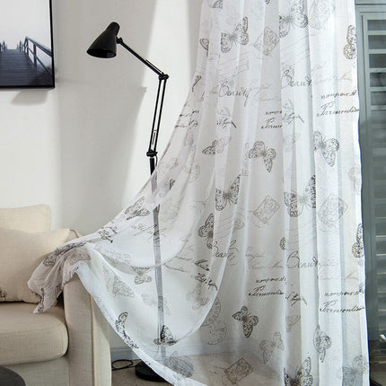 Průsvitná záclona se vzorem motýlů