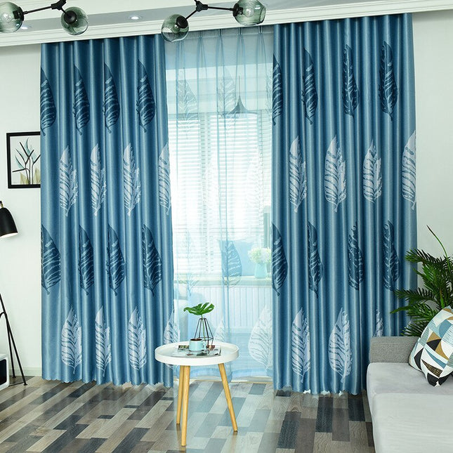 Modrý závěs s moderním vzorem listů