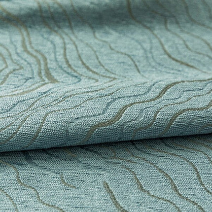 Modrý zatemňovací závěs se vzorem vln