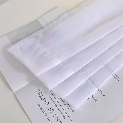 Průsvitná tylová záclona na kroužky