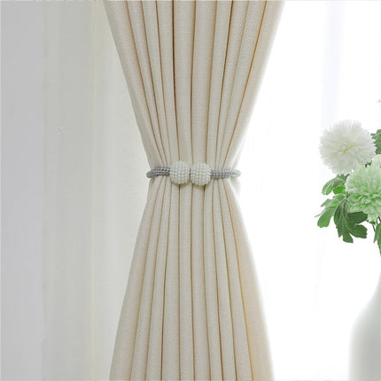 Elegantní béžový závěs do obývacího pokoje