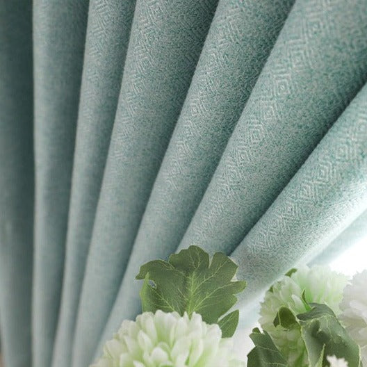 Polozatemňovací závěs tyrkysové barvy