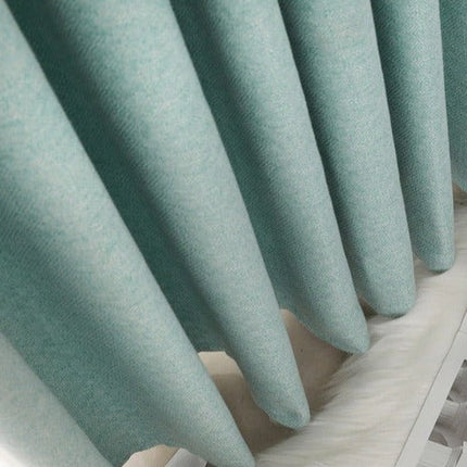 Polozatemňovací závěs tyrkysové barvy