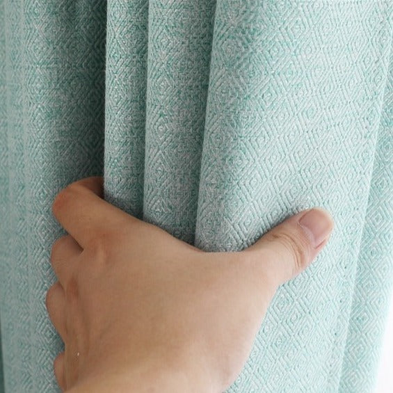 Polozatemňovací závěs tyrkysové barvy