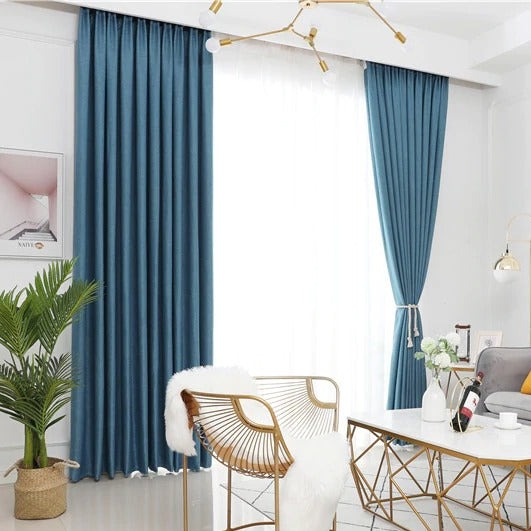 Modrý skandinávský závěs do ložnice