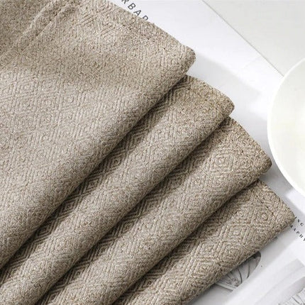 Tmavě béžový elegantní závěs do obýváku