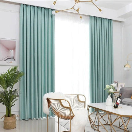 Polozatemňovací závěs tyrkysové barvy