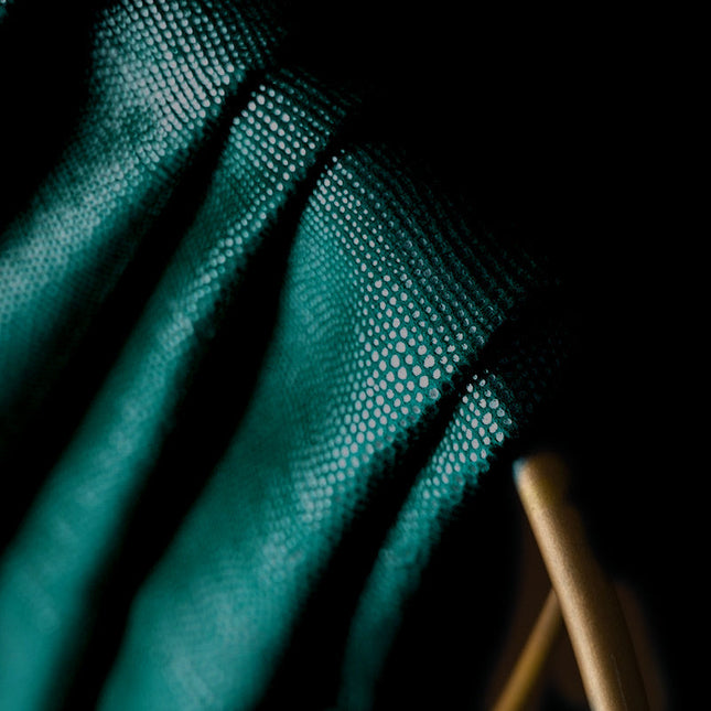 Petrolejově zelený zatemňovací závěs tečkovaný