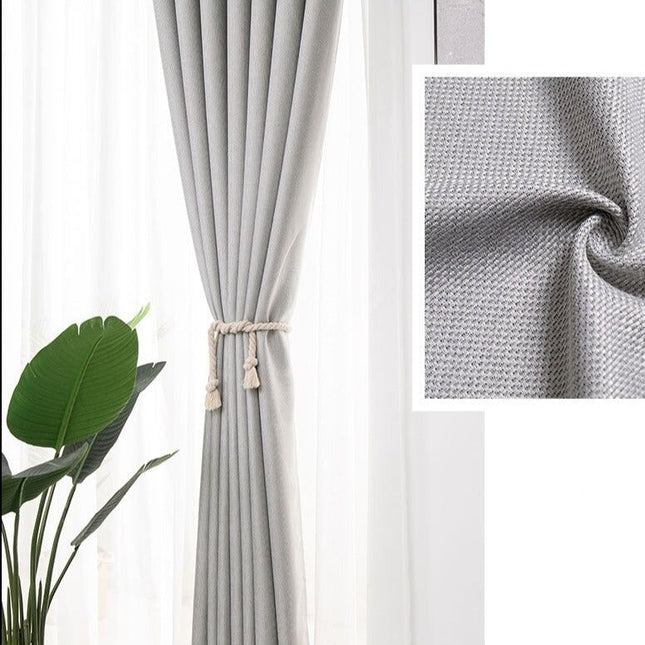 Šedý texturovaný závěs do obývacího pokoje