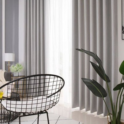 Šedý texturovaný závěs do obývacího pokoje