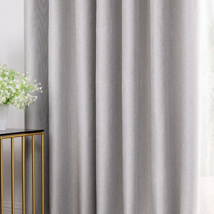 Šedý texturovaný závěs do obývacího pokoje